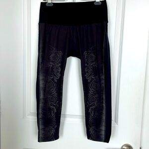 RYU capri leggings. Black with front rose print on legs. Size M